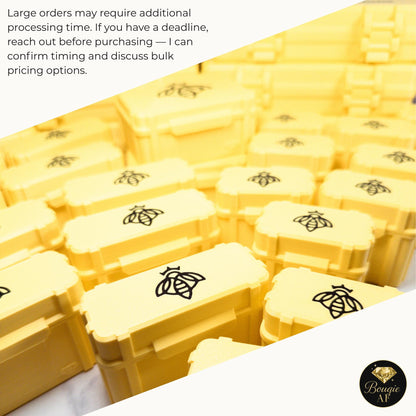 a collection of yellow plastic containers with black bee designs, arranged in rows.