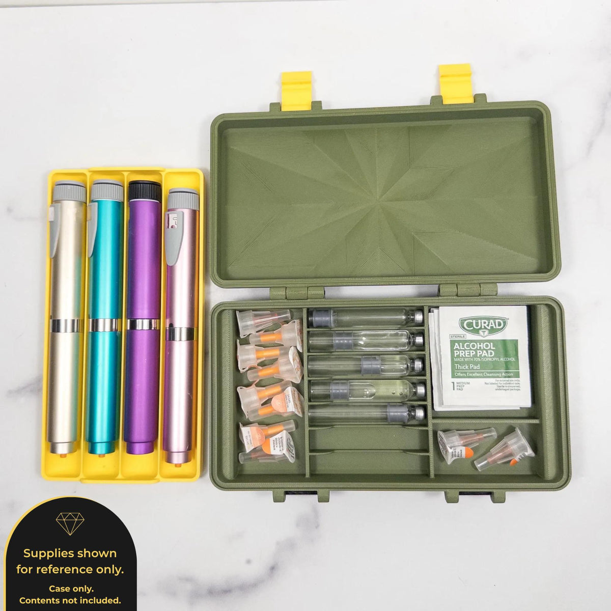 a green container with a yellow lid, containing various medical supplies such as pens, a syringe, and alcohol pads.